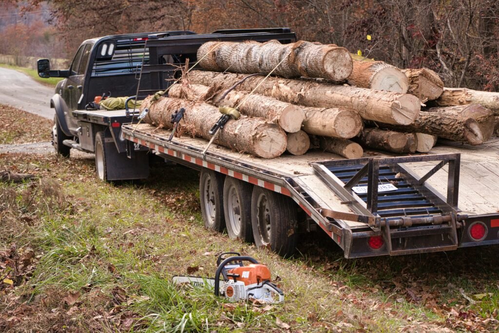 Flatbed Trailer behind three quarter ton truck
